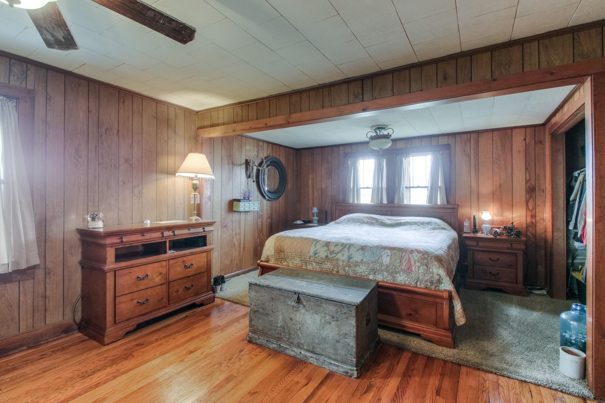 598 White Road Portland, TN 37148 - Photo 14 of 19 a spacious bedroom with a bed and a dresser