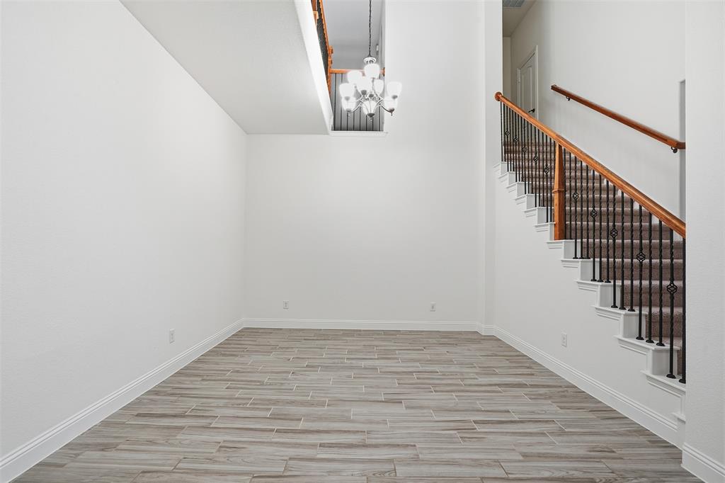 2604 Dylan Lane Mansfield, TX 76063 - Photo 5 of 33 a view of an entryway with wooden floor
