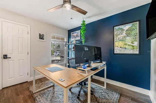 a view of a workspace with furniture