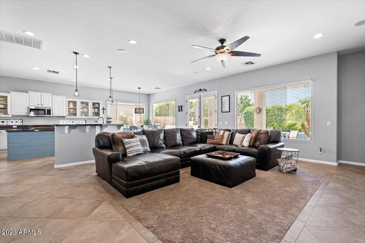 6730 Rachael Way Gilbert, AZ 85298 - Photo 14 of 77 a living room with furniture and a large window