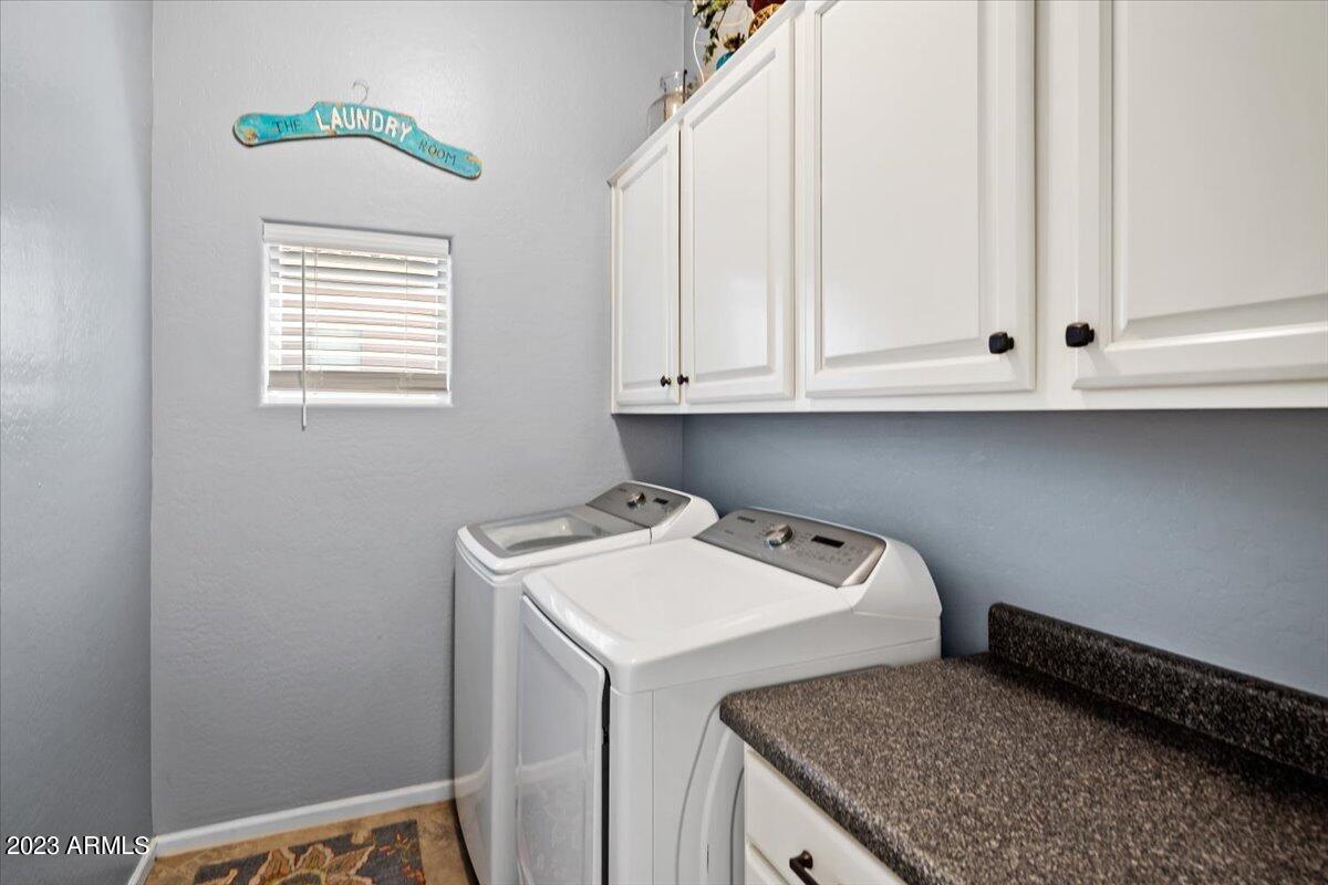 6730 Rachael Way Gilbert, AZ 85298 - Photo 45 of 77 a utility room with dryer and washer