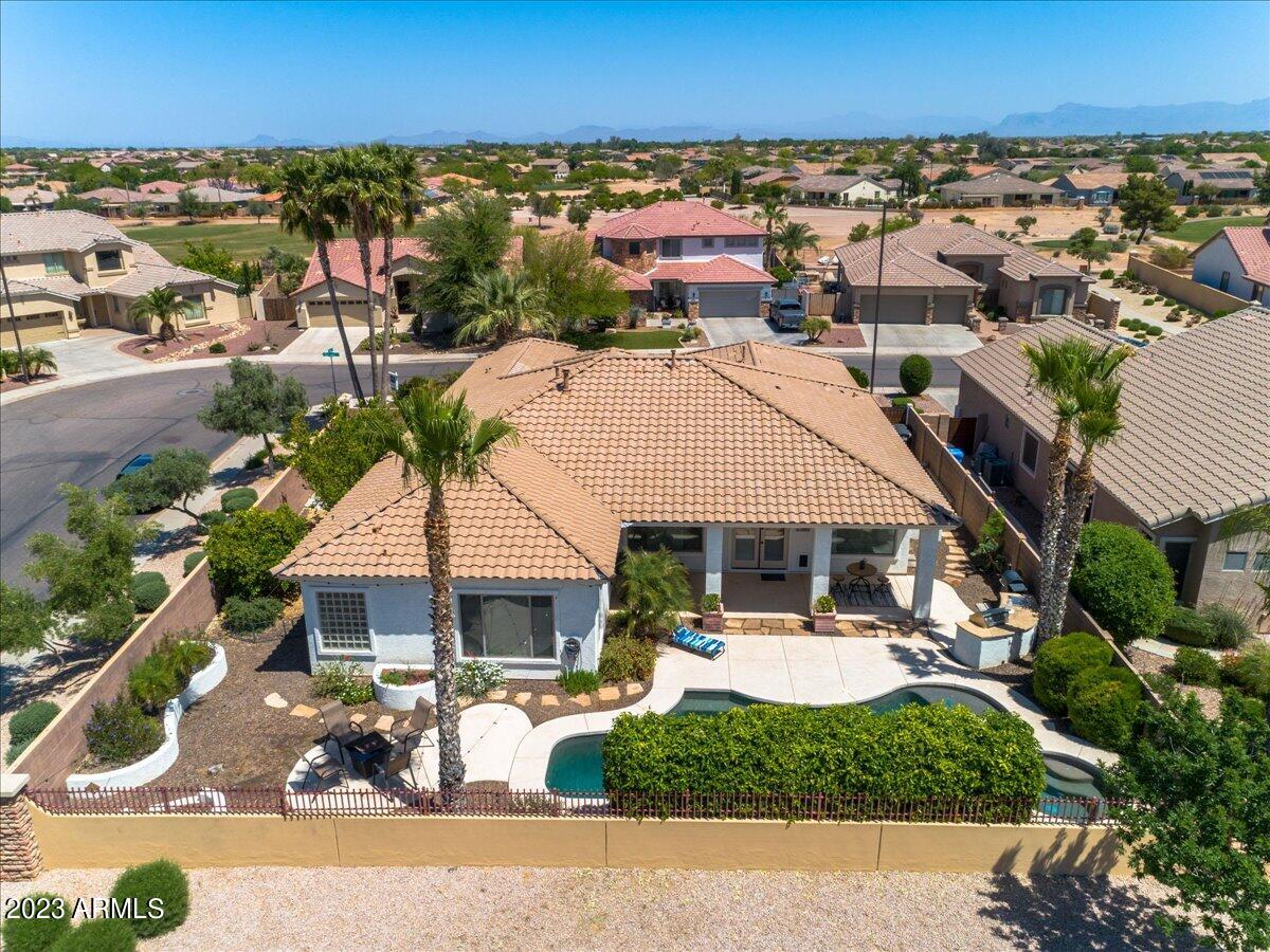 6730 Rachael Way Gilbert, AZ 85298 - Photo 59 of 77 an aerial view of a house with a garden and lake view
