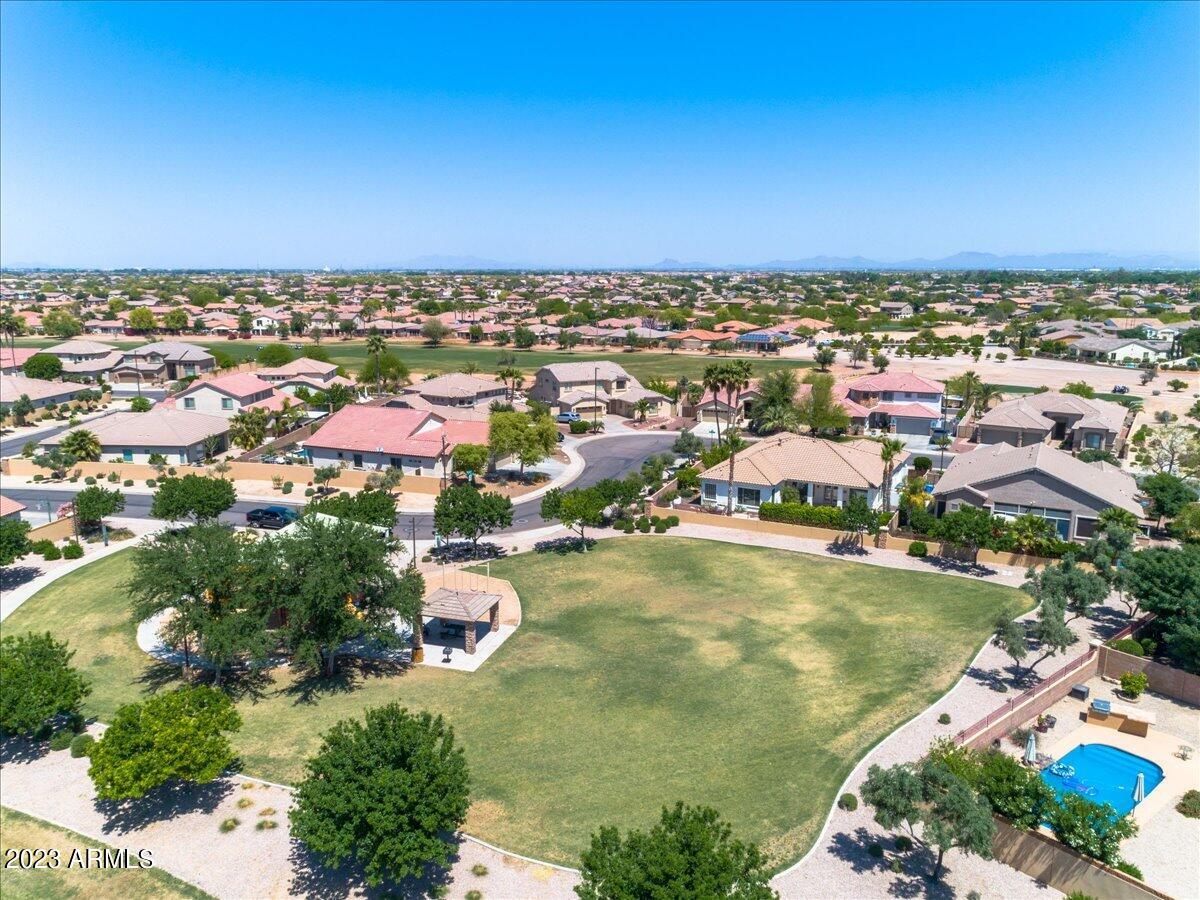 6730 Rachael Way Gilbert, AZ 85298 - Photo 63 of 77 an aerial view of residential houses with outdoor space