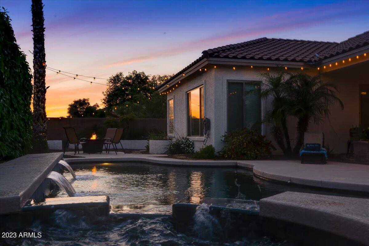 6730 Rachael Way Gilbert, AZ 85298 - Photo 71 of 77 a view of house with swimming pool and a yard