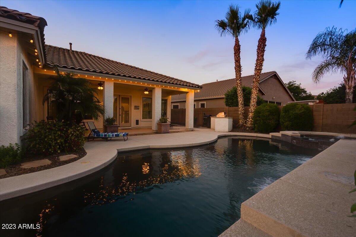 6730 Rachael Way Gilbert, AZ 85298 - Photo 73 of 77 a view of a house with swimming pool and sitting area
