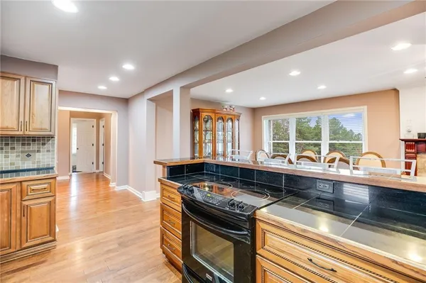 a kitchen with a stove and a sink