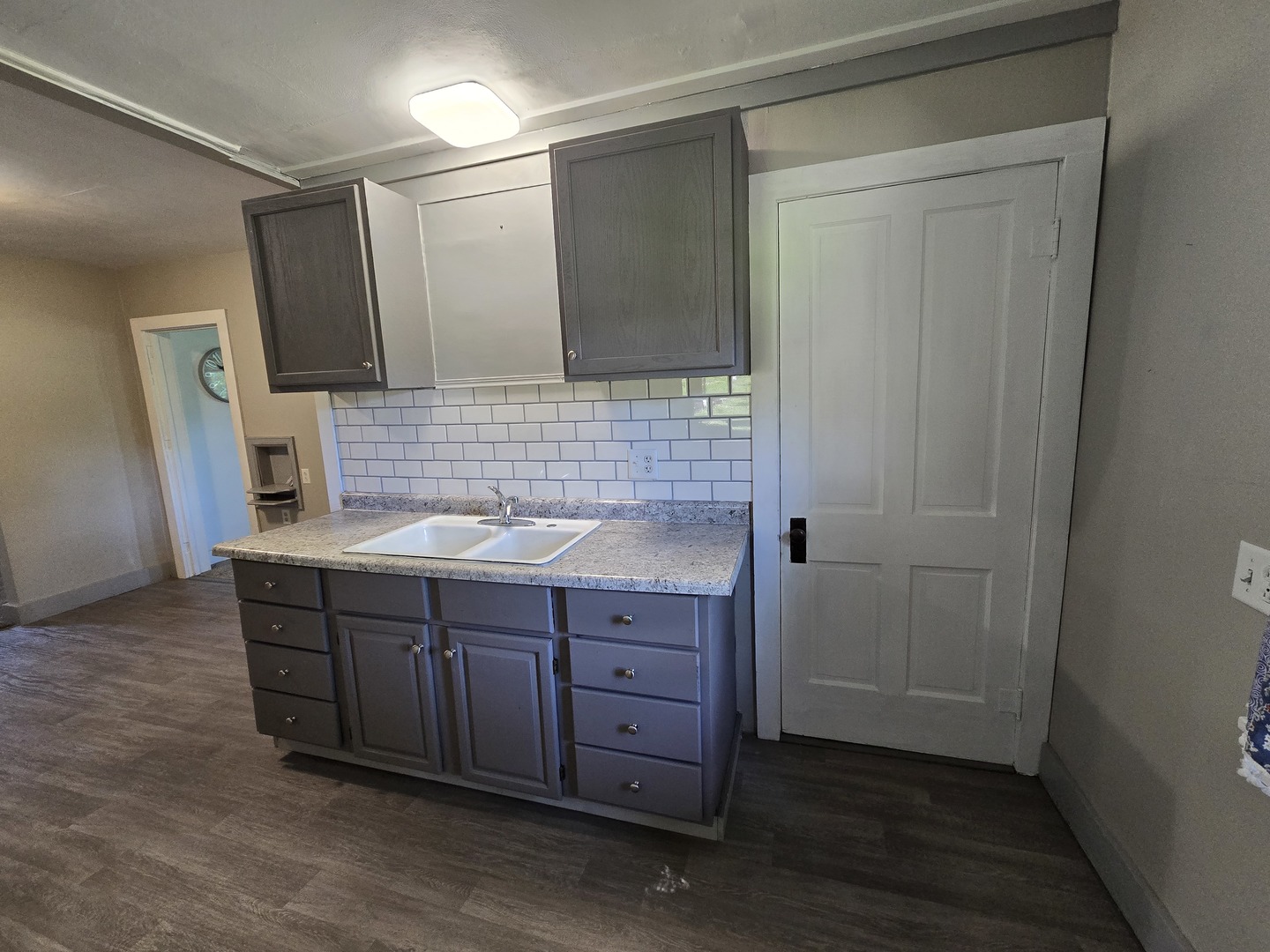 201 West Grove Road Sterling, IL 61081 - Photo 13 of 19 a bathroom with a sink and a mirror