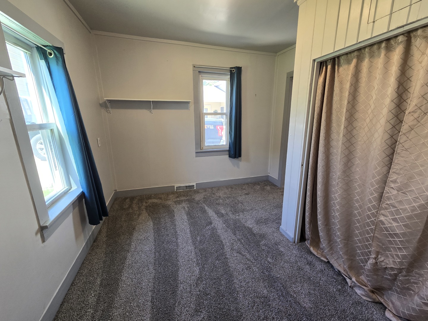 201 West Grove Road Sterling, IL 61081 - Photo 5 of 19 a view of wooden floor and windows in a room