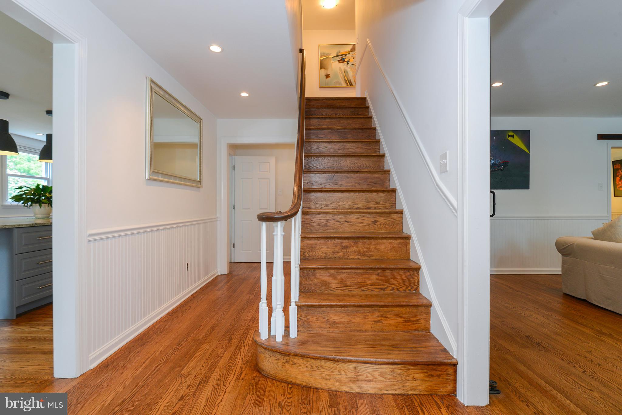 401 North Spring Mill Road Villanova, PA 19085 - Photo 8 of 39 Kitchen and dining to the left living to the right