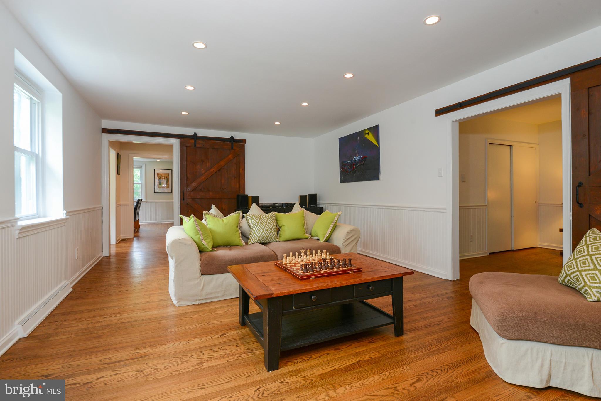 401 North Spring Mill Road Villanova, PA 19085 - Photo 9 of 39 Living room with first floor bedroom entrance