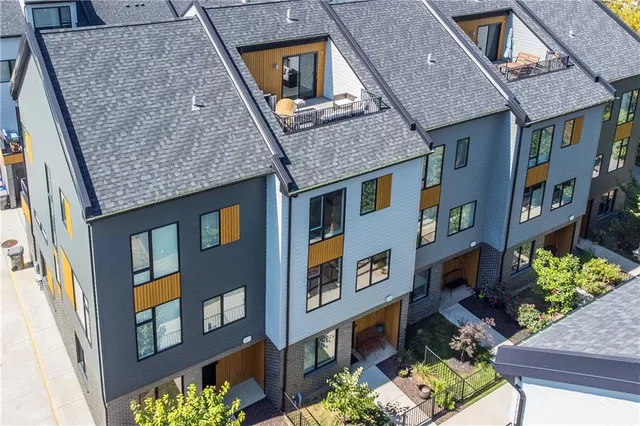 a front view of a multi story residential apartment building