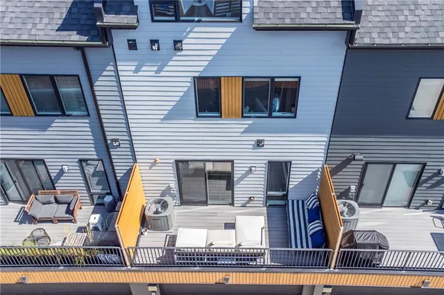 a view of roof deck with patio