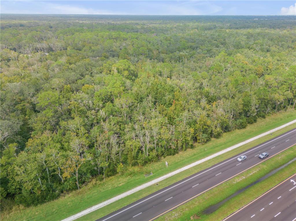 0 Indian River Boulevard Edgewater, FL 32132 - Photo 11 of 11 a view of a yard with an outdoor space