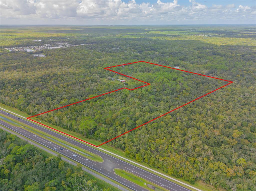 0 Indian River Boulevard Edgewater, FL 32132 - Photo 7 of 11 a view of a field with an ocean view