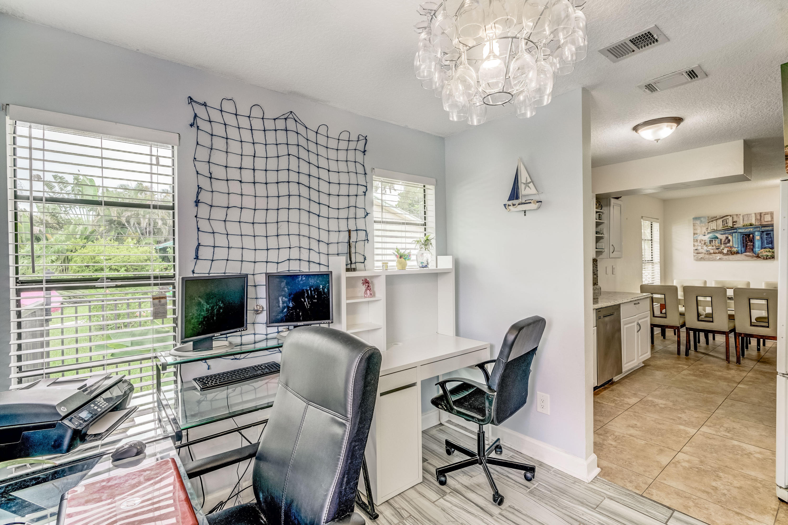 6120 Wolfe Street Jupiter, FL 33458 - Photo 10 of 55 Bamboo floors and tile throughout
