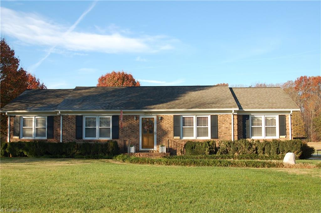 3945 Lewiston Road Summerfield, NC 27358 - Photo 1 of 18 Front of House