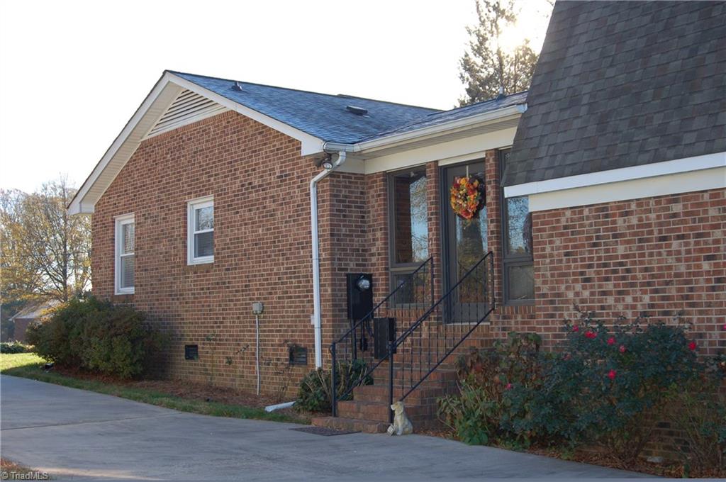 3945 Lewiston Road Summerfield, NC 27358 - Photo 14 of 18 Driveway side of House