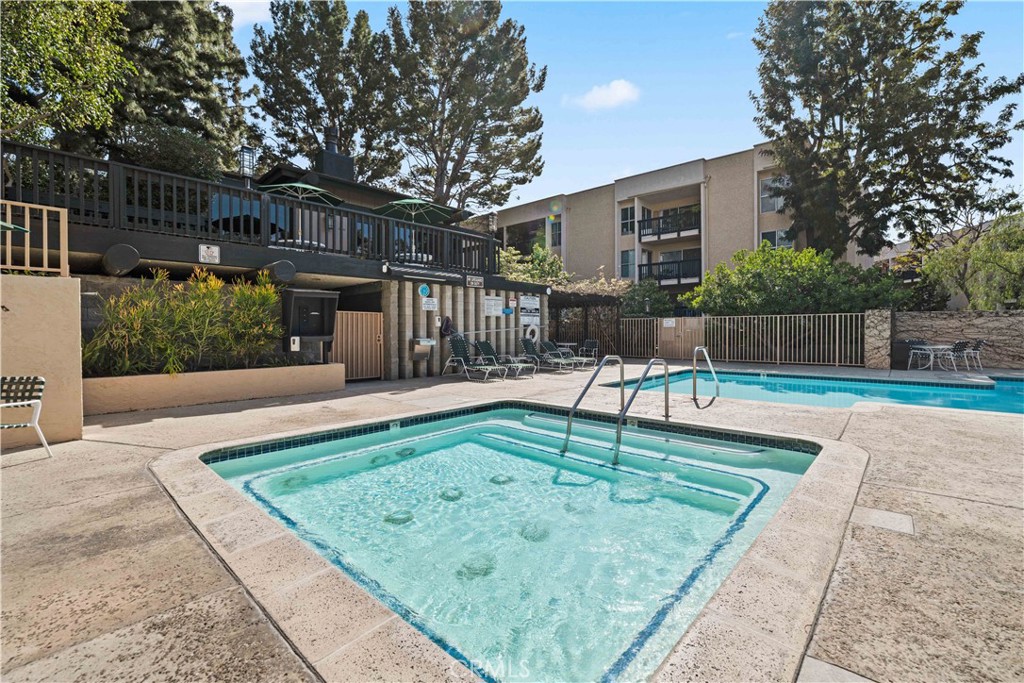 8108 Raintree Circle Culver City, CA 90230 - Photo 12 of 18 a view of a backyard with a patio and plants