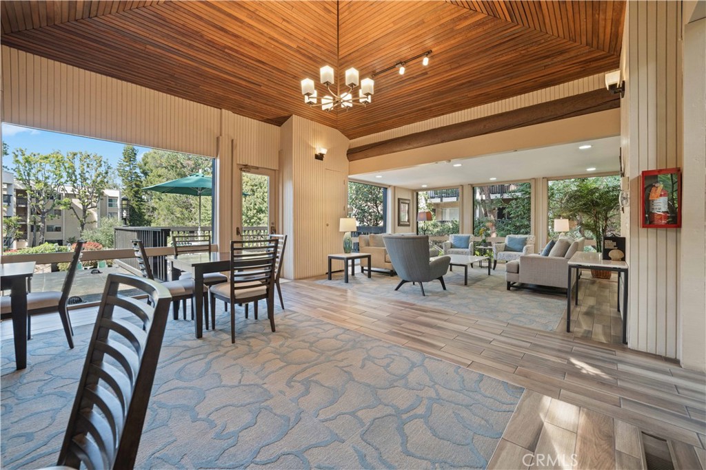 8108 Raintree Circle Culver City, CA 90230 - Photo 14 of 18 a view of a dining room with furniture window and outside view