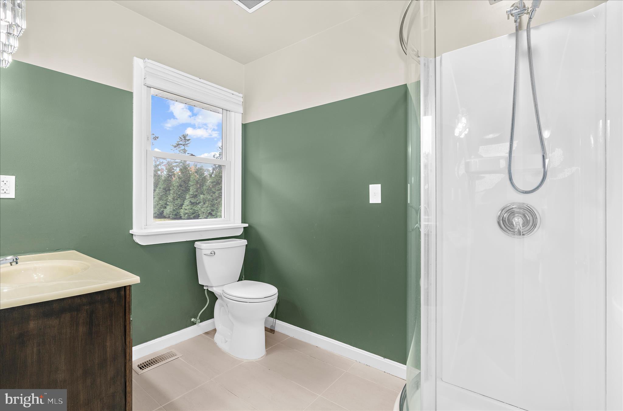 116 Talbot Road Stevensville, MD 21666 - Photo 16 of 33 a bathroom with a toilet sink and shower