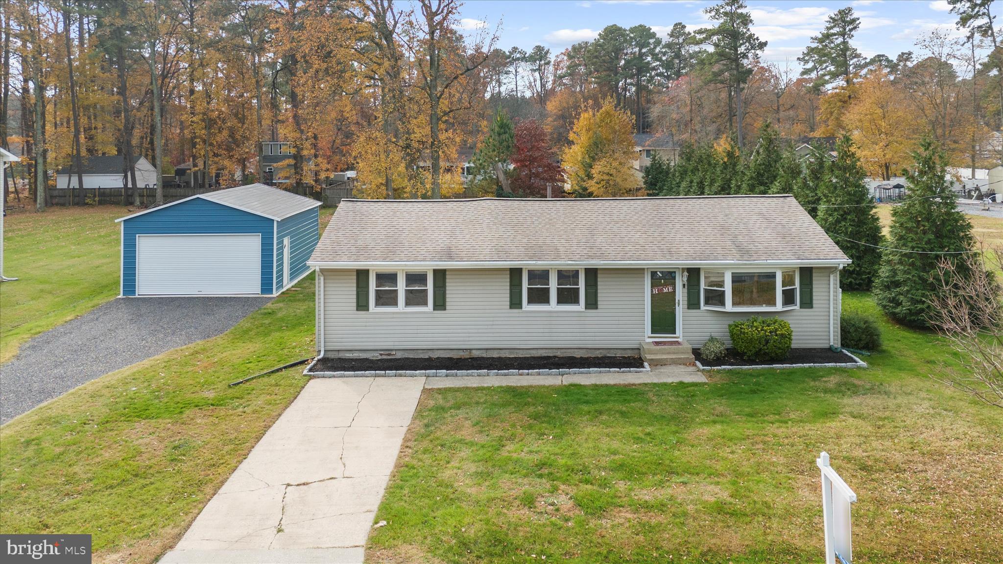 116 Talbot Road Stevensville, MD 21666 - Photo 2 of 33 a aerial view of a house with a yard patio and fire pit