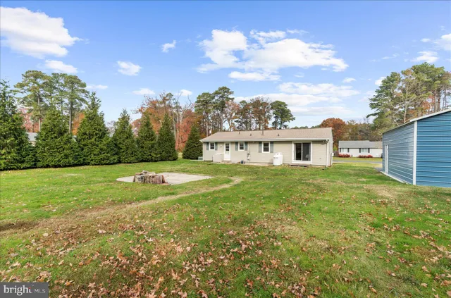 a view of a house with a big yard