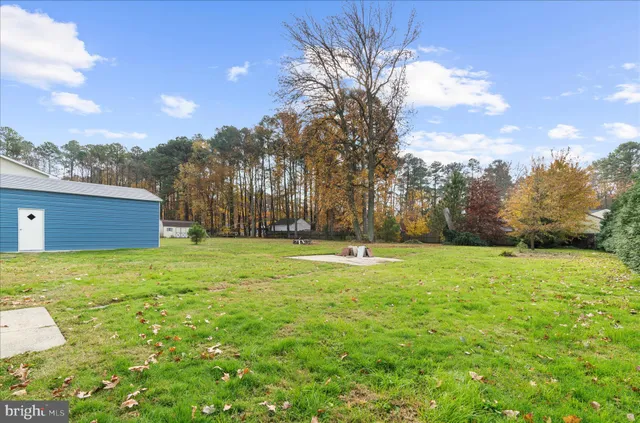 a fire hydrant in the middle of a field