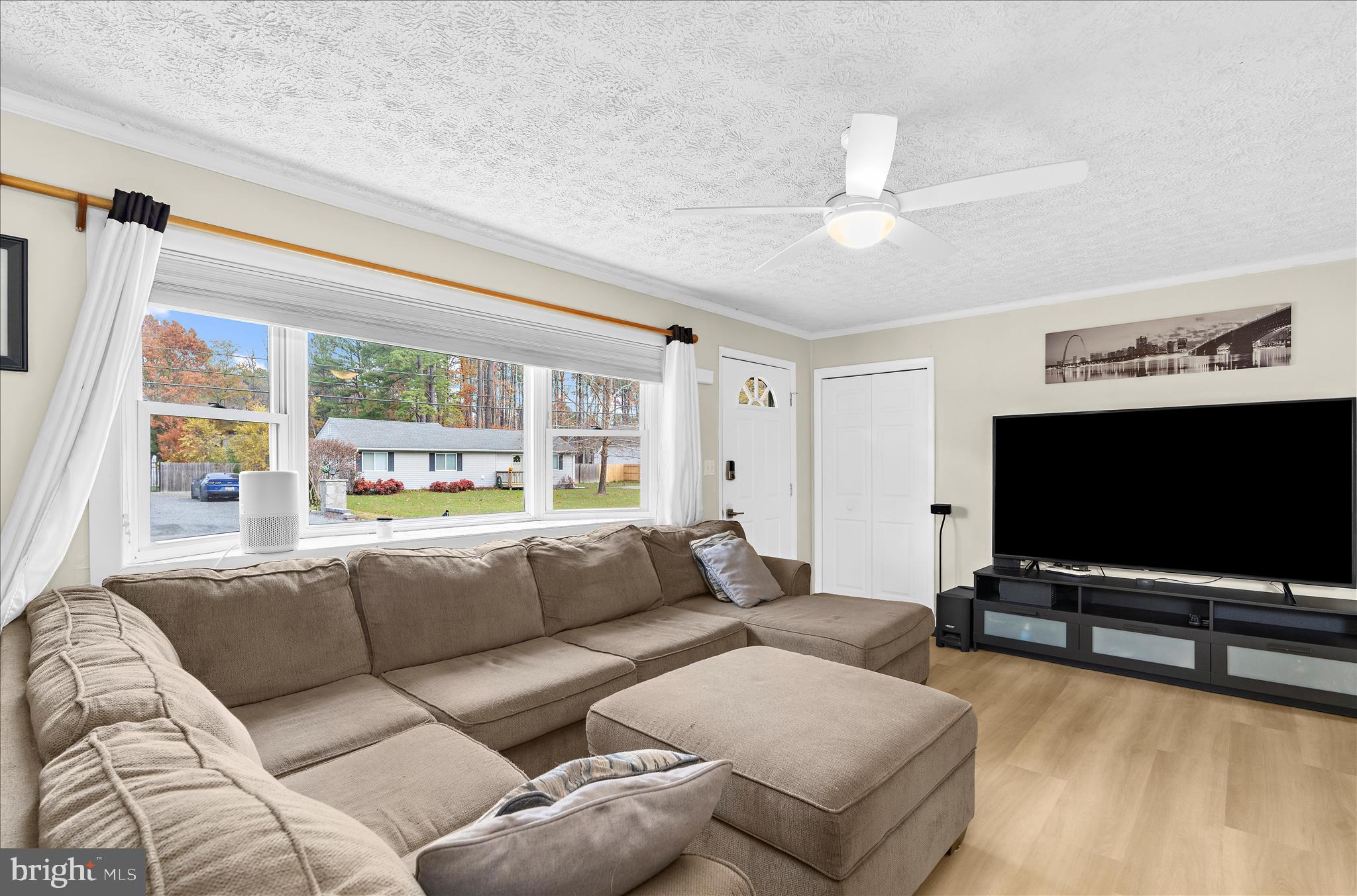 116 Talbot Road Stevensville, MD 21666 - Photo 7 of 33 a living room with furniture and a flat screen tv