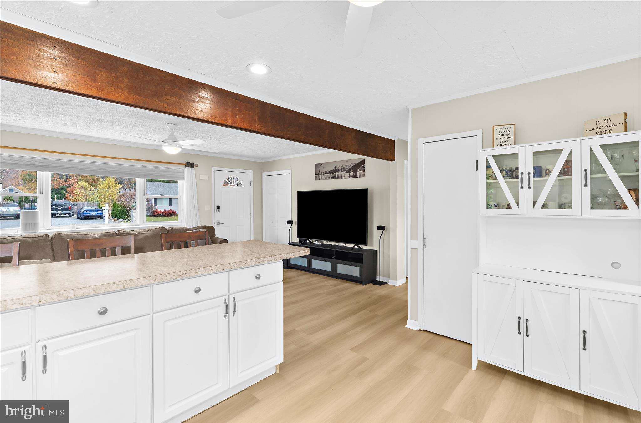 116 Talbot Road Stevensville, MD 21666 - Photo 9 of 33 a living room with furniture and a flat screen tv