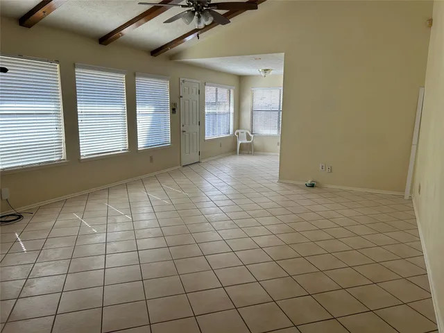 a view of an empty room and window