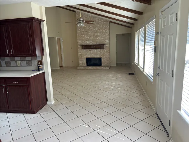 a view of a kitchen with storage and utility