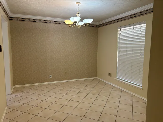 a view of an empty room with window