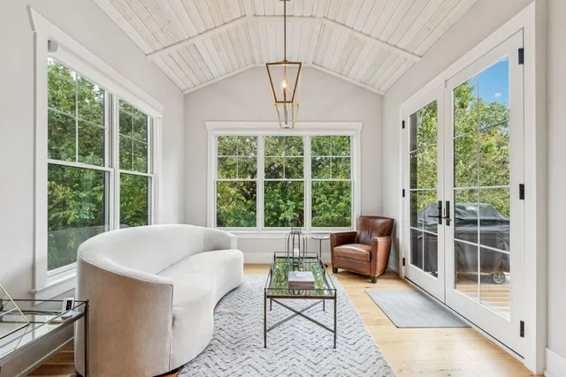 a outdoor space with patio the couches and a potted plant with outer view
