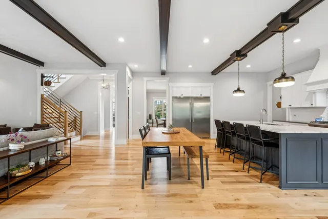 a kitchen with a sink and a stove top oven