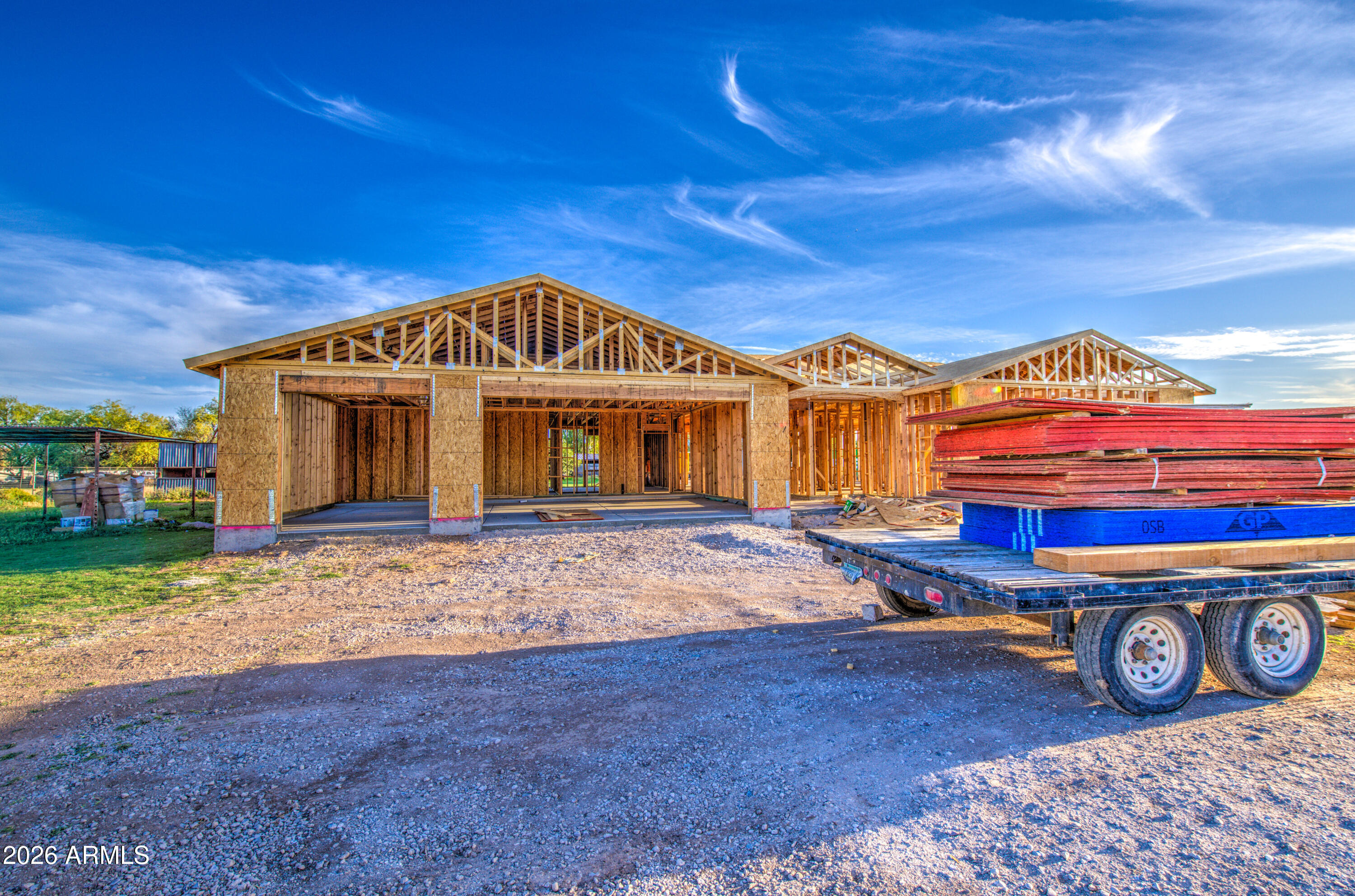 10931 West Lower Buckeye Road Tolleson, AZ 85353 - Photo 4 of 18 a front view of a house with a yard