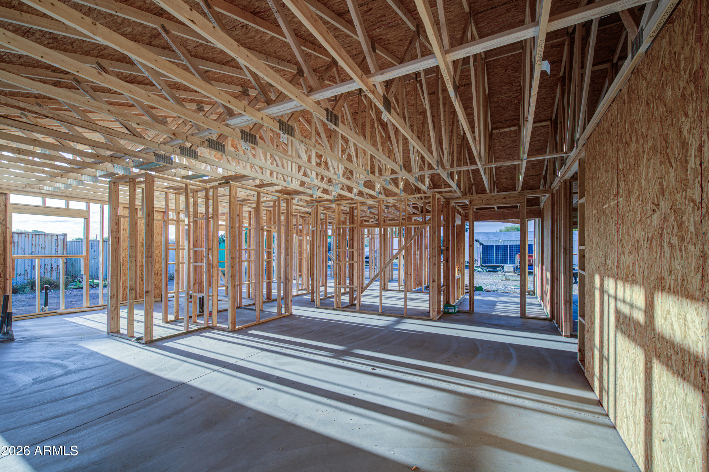 10931 West Lower Buckeye Road Tolleson, AZ 85353 - Photo 8 of 18 a view of a room with wooden floor