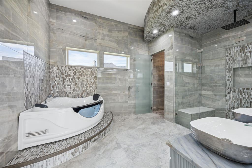 1933 Noe Boulevard Heath, TX 75126 - Photo 20 of 40 Luxurious bathroom with jetted tub, steam and bodyspray shower