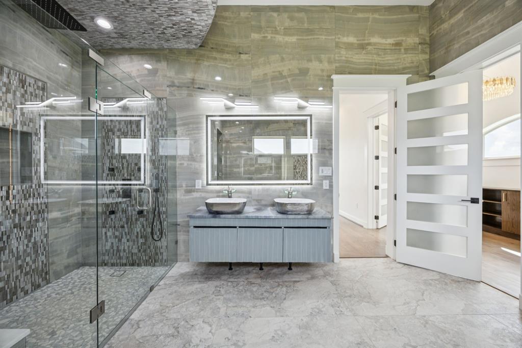 1933 Noe Boulevard Heath, TX 75126 - Photo 21 of 40 Luxurious bathroom with jetted tub, steam and bodyspray shower