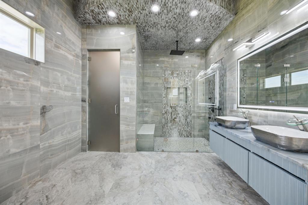 1933 Noe Boulevard Heath, TX 75126 - Photo 22 of 40 Luxurious bathroom with jetted tub, steam and bodyspray shower