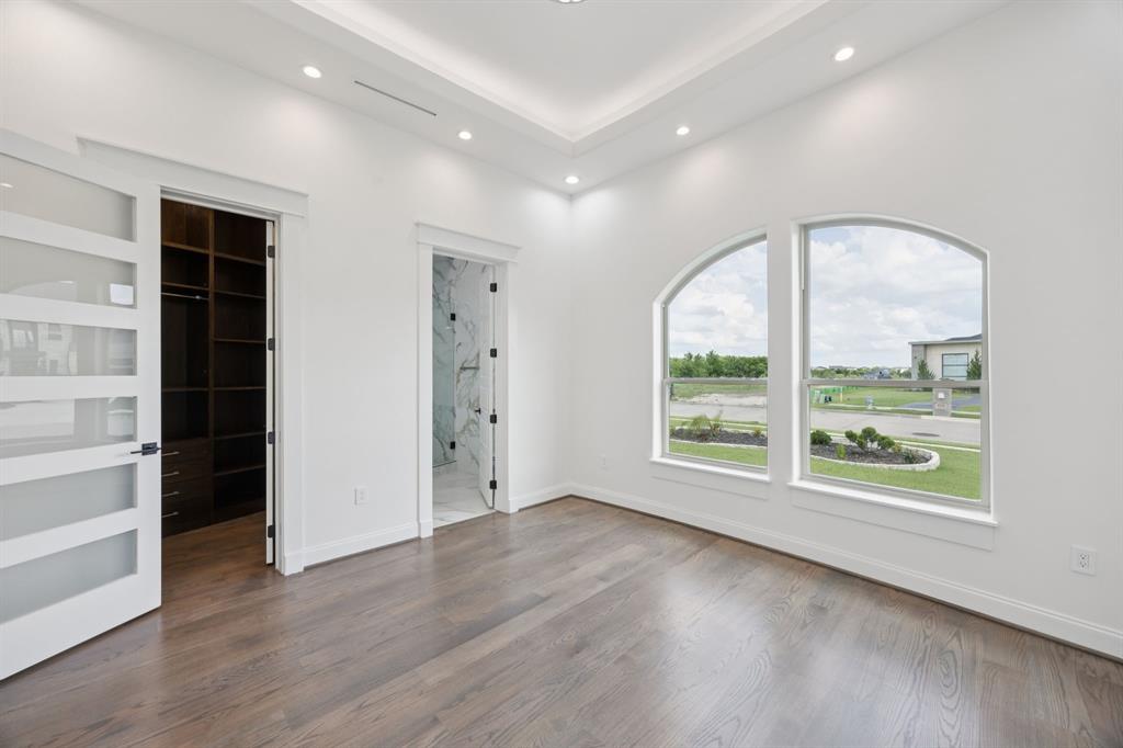 1933 Noe Boulevard Heath, TX 75126 - Photo 26 of 40 Guest bedroom suite