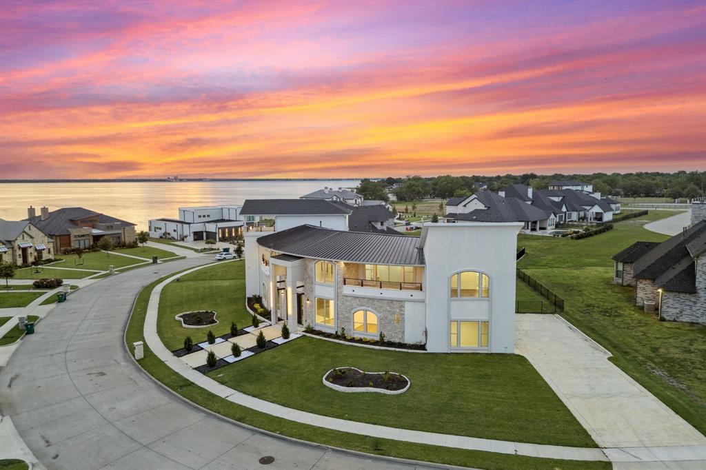 1933 Noe Boulevard Heath, TX 75126 - Photo 3 of 40 Expansive home with a generous driveway to park up to 9 cars