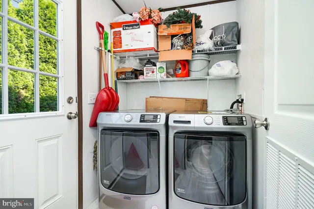 a utility room with dryer and washer
