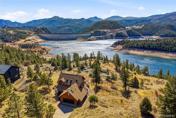 a view of houses with outdoor space and river