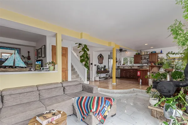 a living room with furniture and a table