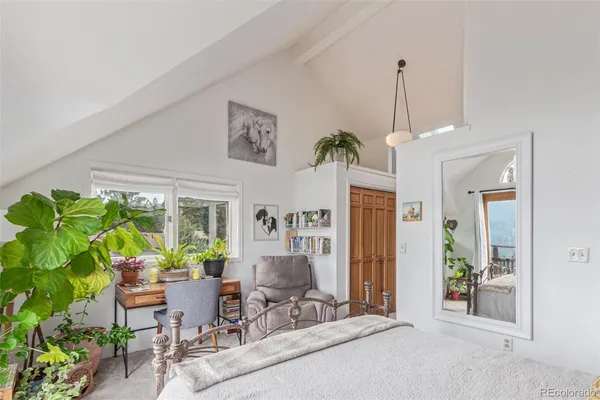 a living room with patio furniture