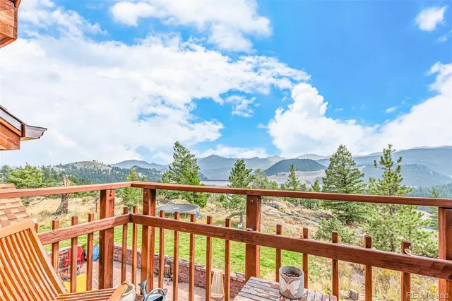 a view of a city street from a balcony