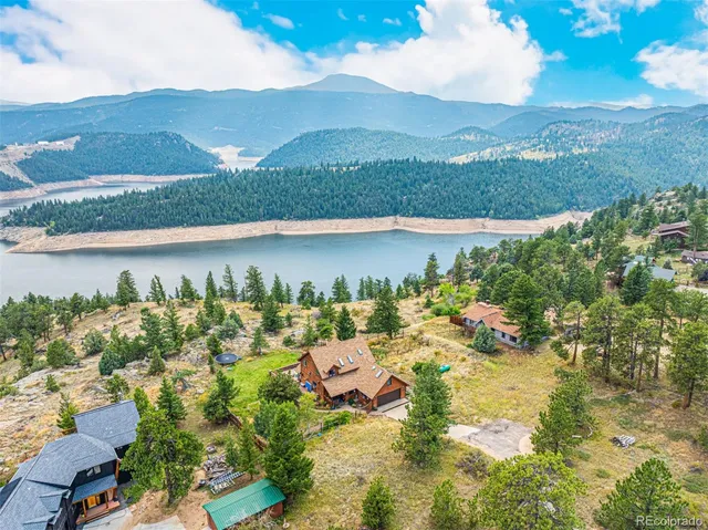 a view of a lake with a mountain in the background