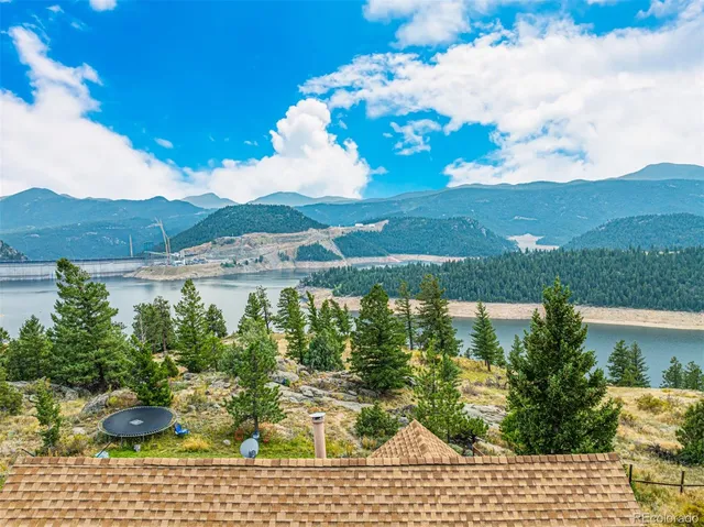 a view of lake from balcony with outdoor space