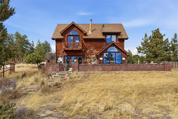 a front view of house with yard