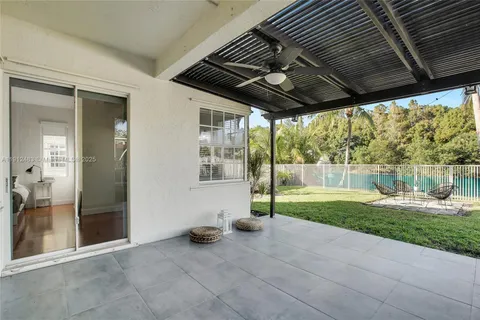 a view of backyard with green space